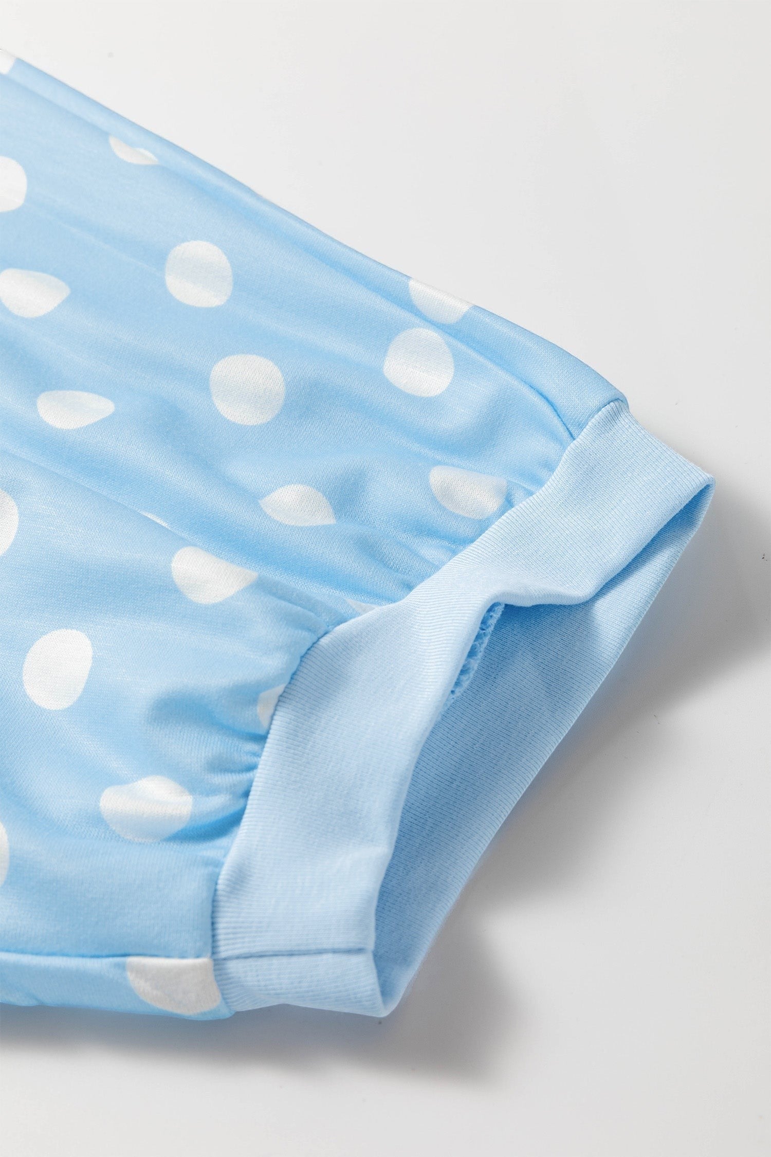 Doodlations Coffee Bar & Boutique light blue lounge set sleeve with white polka dot print and ribbed cuff detail