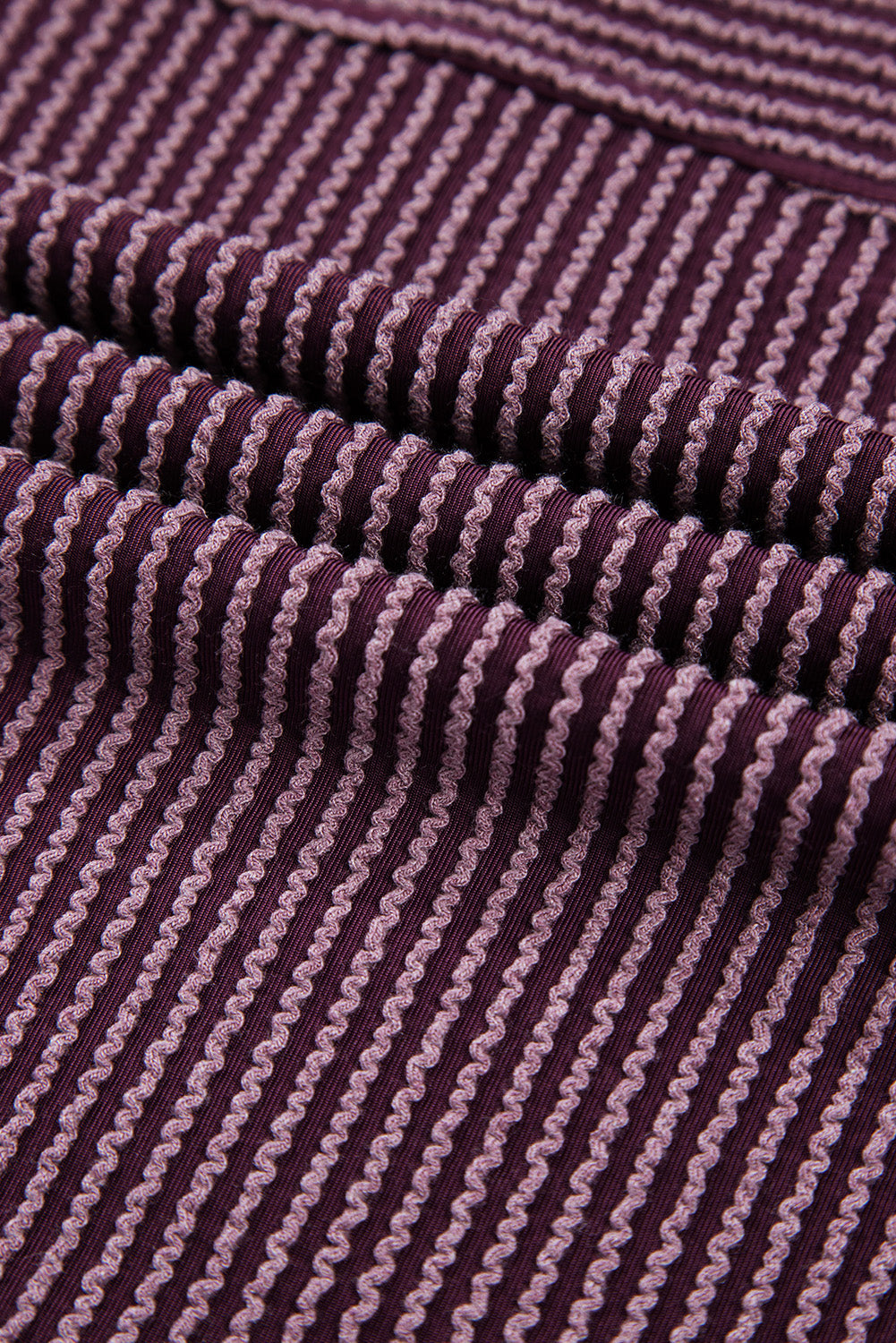 Doodlations Coffee Bar & Boutique purple corded knit fabric with vertical ribbed texture detail