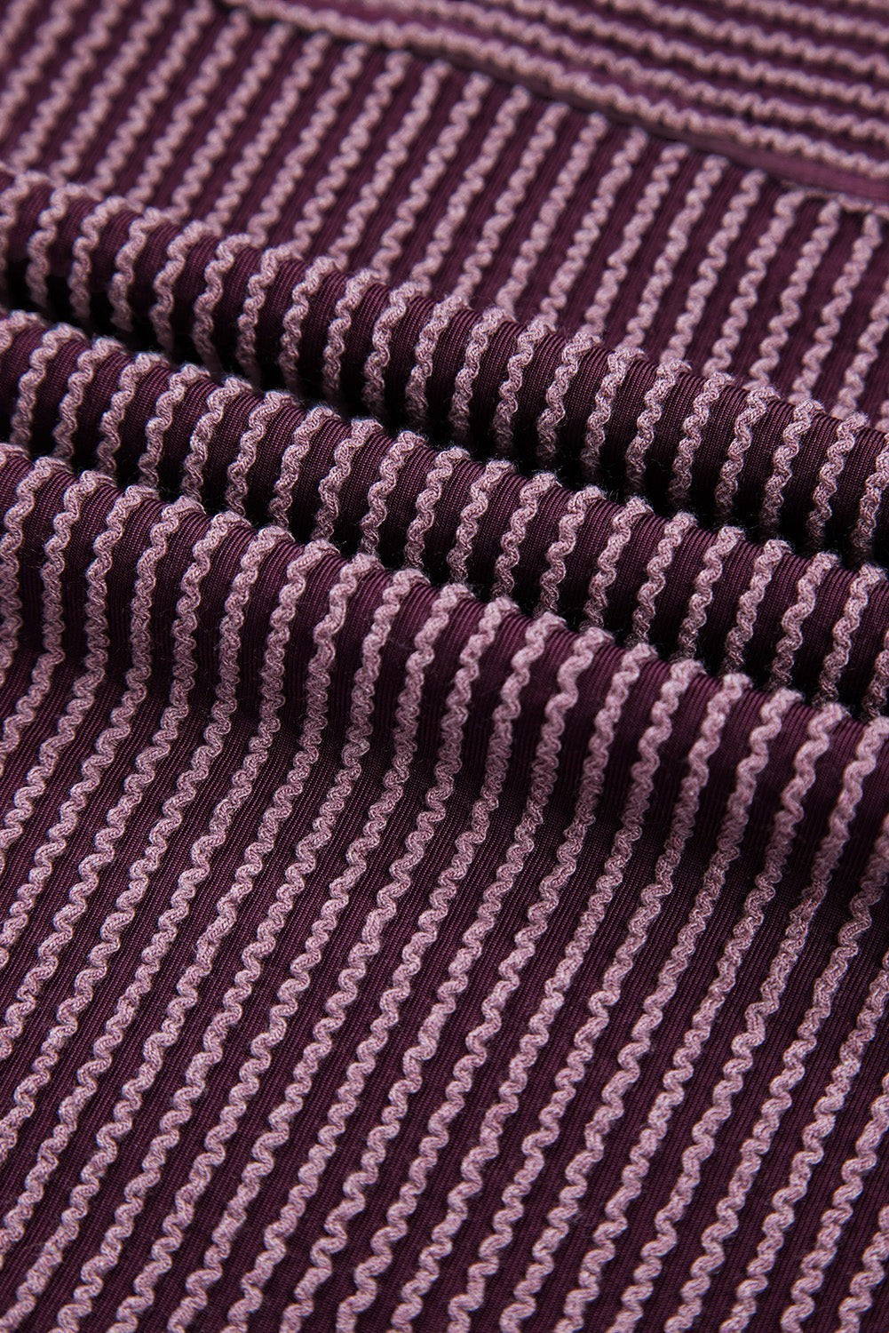 Doodlations Coffee Bar & Boutique purple corded knit fabric with vertical ribbed texture detail