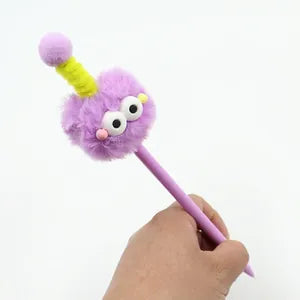 Doodlations Coffee Bar & Boutique purple fuzzy monster gel pen with googly eyes and a yellow antenna topper