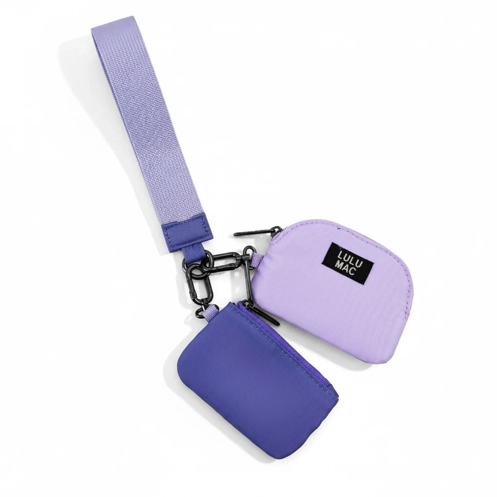 Doodlations Coffee Bar & Boutique Lulu Mac double pouch wristlet in purple and lavender with a matching wrist strap