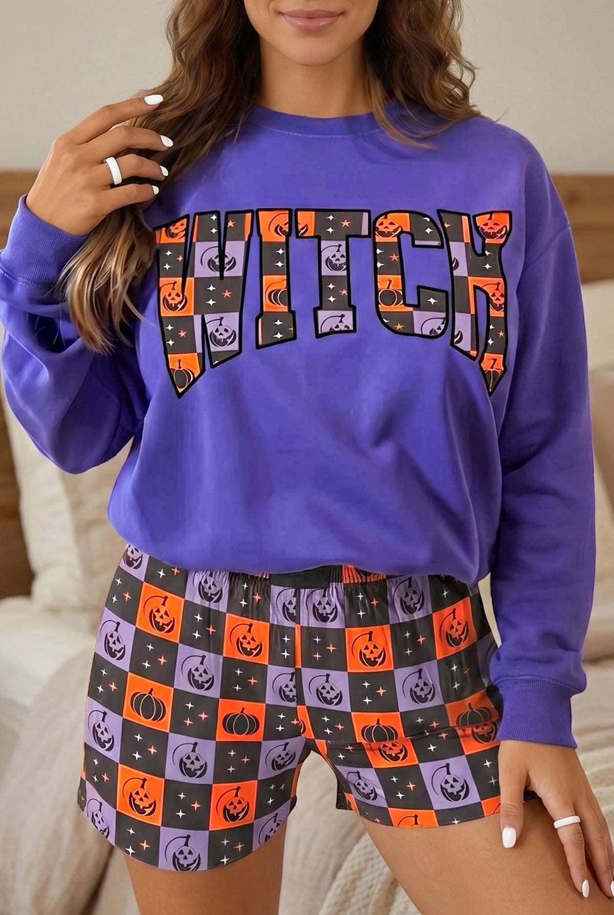 Doodlations Coffee Bar & Boutique purple long sleeve witch sweatshirt and checkered pumpkin print shorts lounge set
