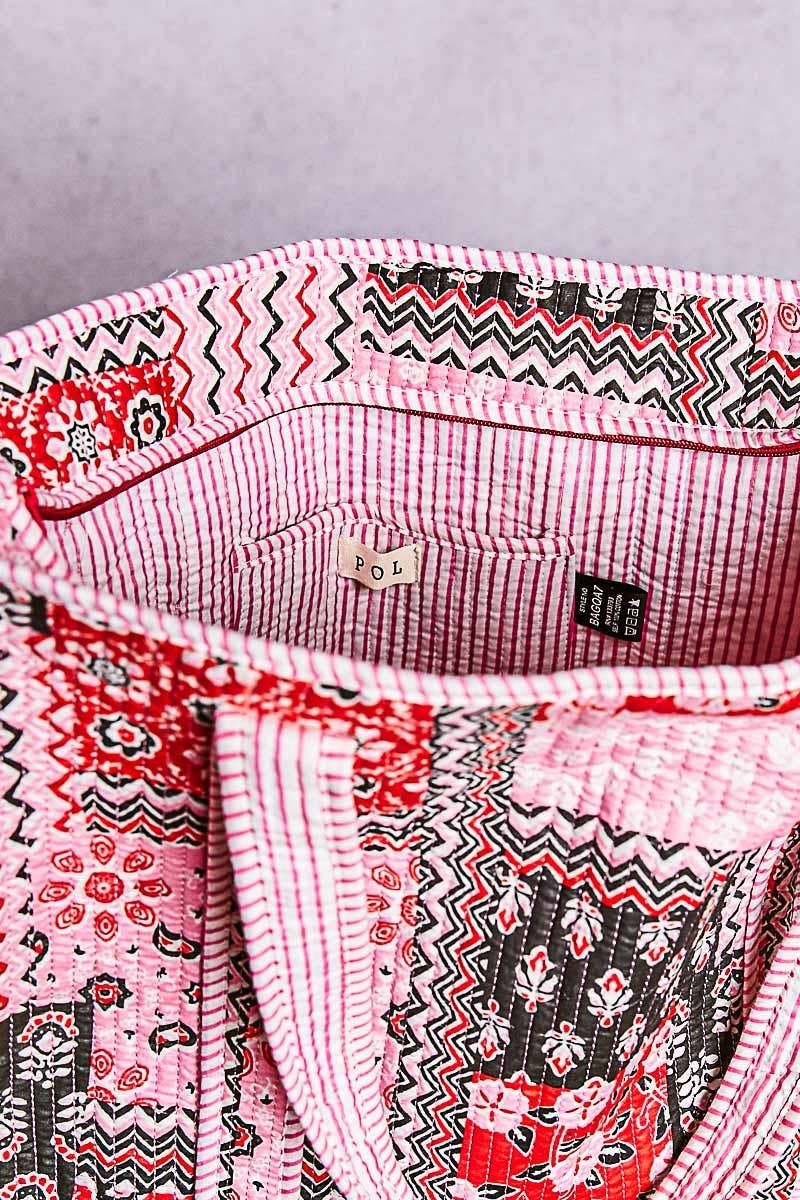 Doodlations Coffee Bar & Boutique quilted woven tote bag with red and black bohemian print and striped interior