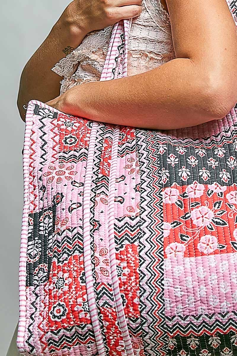 Doodlations Coffee Bar & Boutique quilted woven tote bag with pink and black bohemian floral and geometric prints