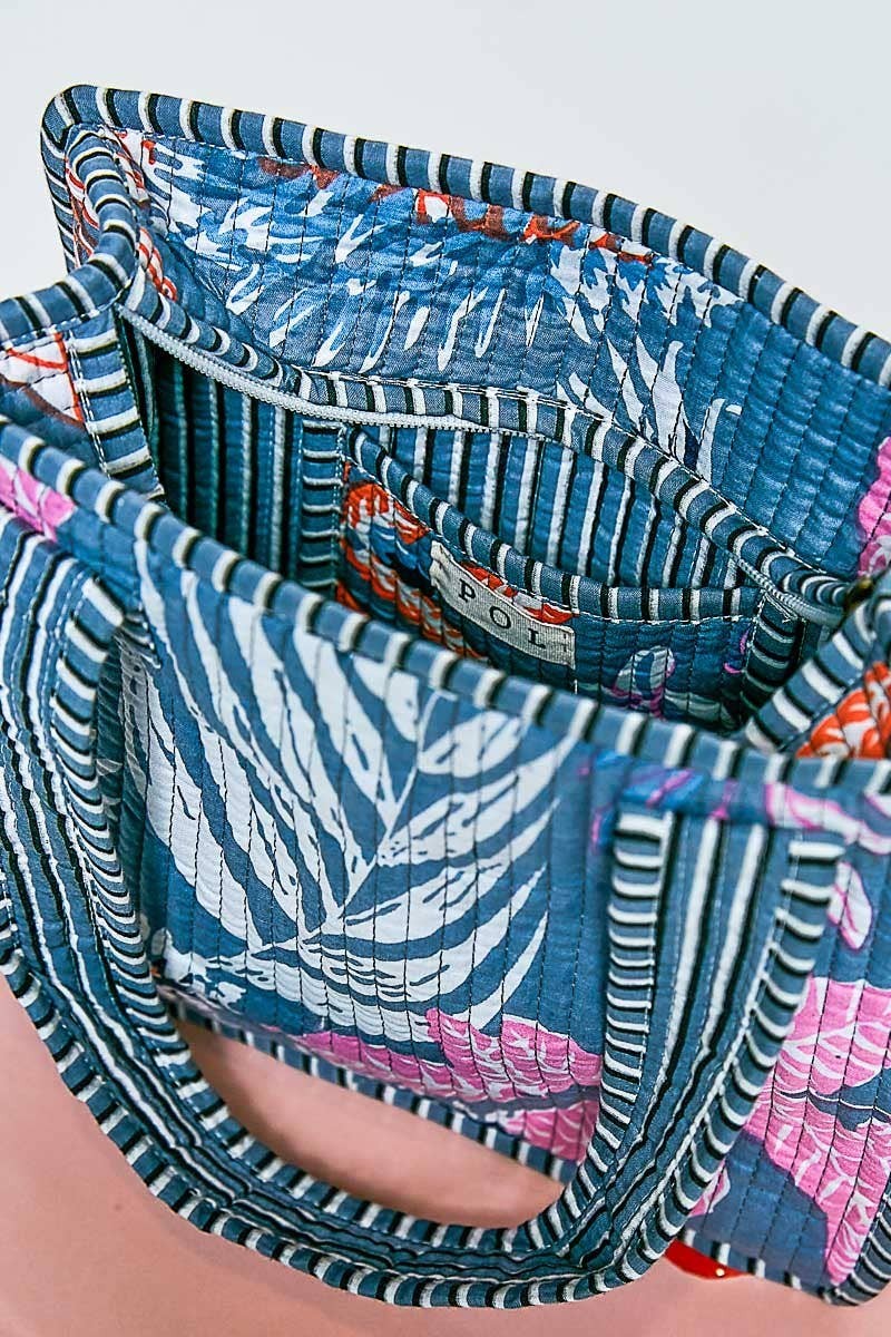 Doodlations Coffee Bar & Boutique mini quilted cotton cube bag with blue and pink floral screen-printed pattern
