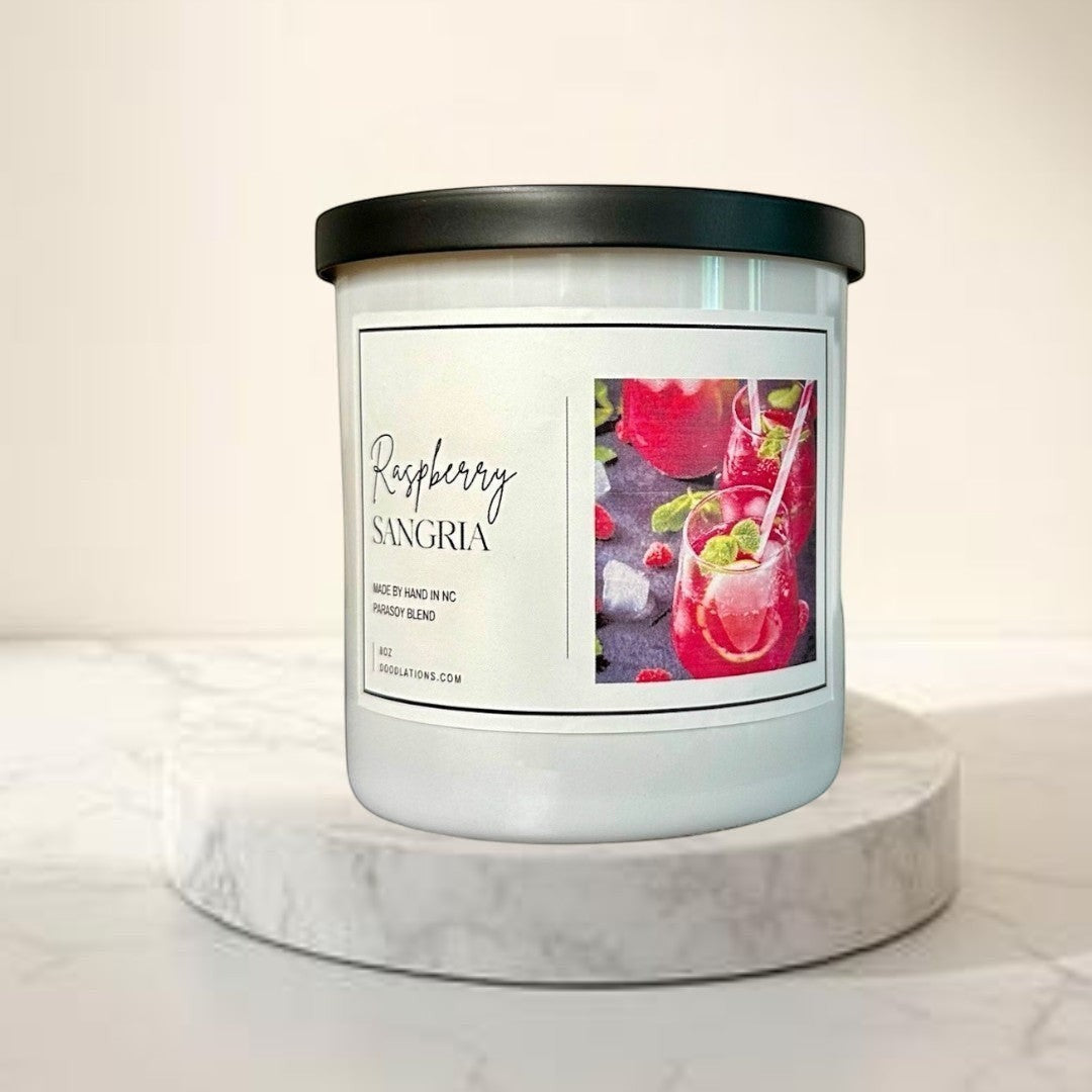 Doodlations Coffee Bar & Boutique Raspberry Sangria luxury soy blend candle with a fruity sangria scent.