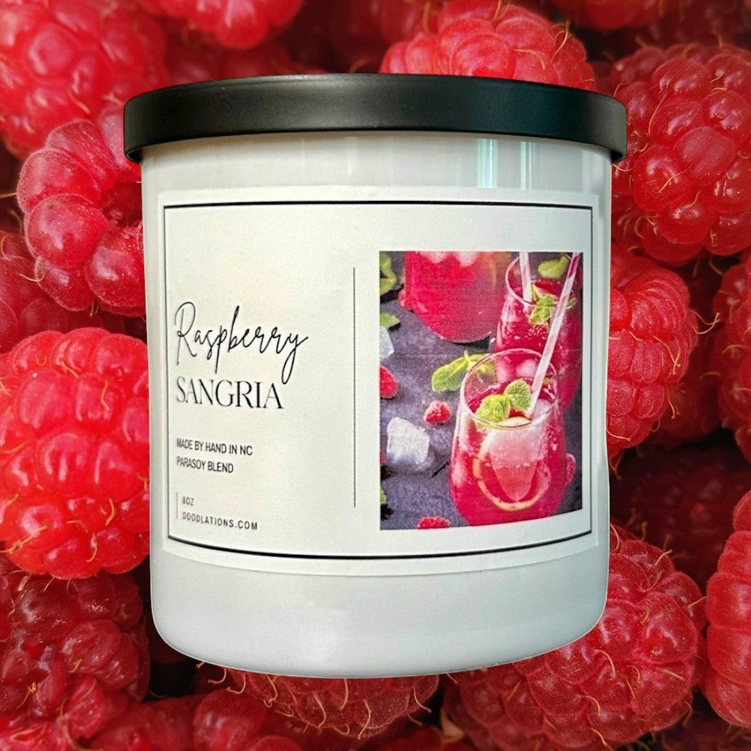 Doodlations Coffee Bar & Boutique Raspberry Sangria luxury soy blend candle with a fruity sangria scent.