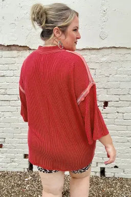 Doodlations Coffee Bar & Boutique fiery red ribbed tunic with round neck and bracelet sleeves, back view