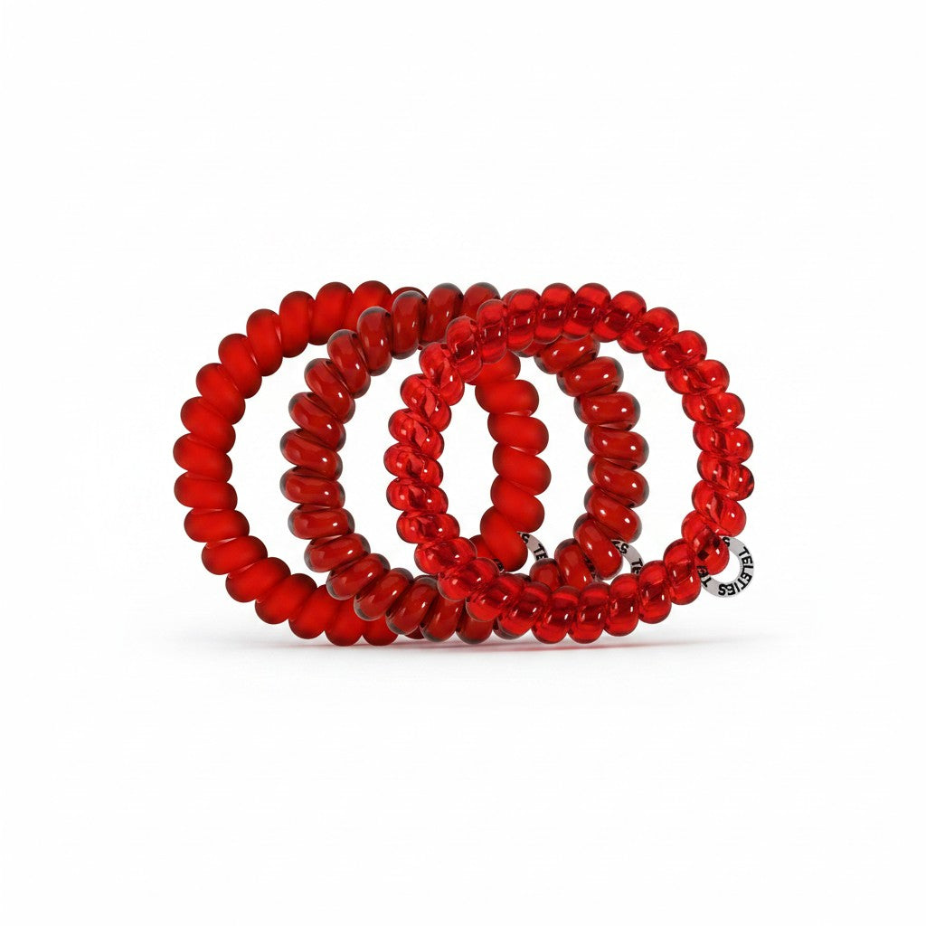 Doodlations Coffee Bar & Boutique red spiral hair ties that prevent breakage and double as stylish bracelets.