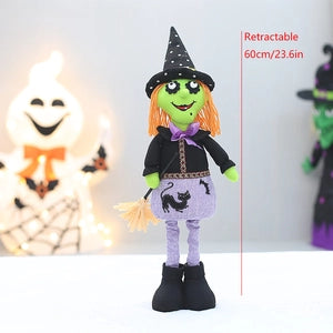 Doodlations Coffee Bar & Boutique retractable witch plush doll with orange hair and black hat for Halloween decor