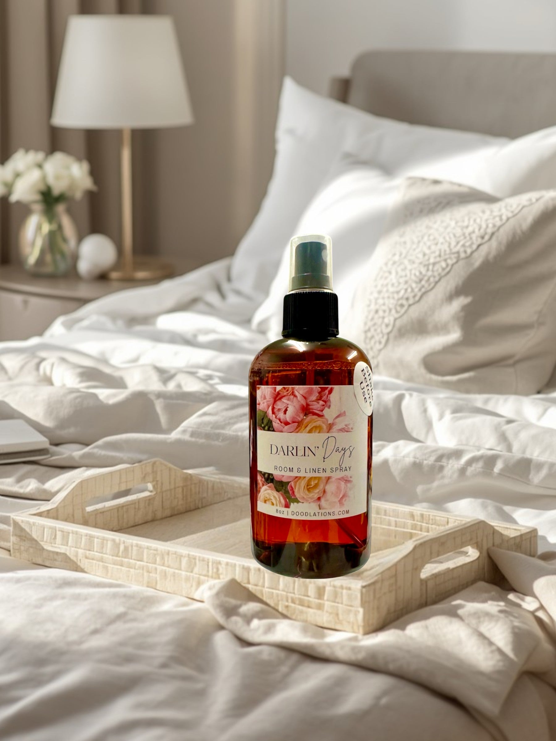 Doodlations Coffee Bar & Boutique Darlin' Days Room & Linen Spray with floral label and amber bottle.