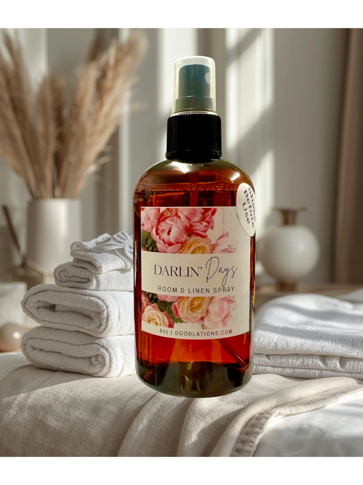 Doodlations Coffee Bar & Boutique Darlin Days Room & Linen Spray with floral label and amber bottle.
