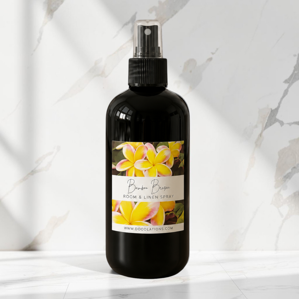 Doodlations Coffee Bar & Boutique Bum Bum room and linen spray in a black bottle with a floral label