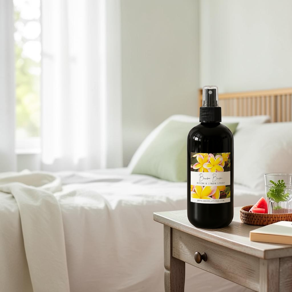 Doodlations Coffee Bar & Boutique Bum Bum room and linen spray in a black bottle with a tropical floral label