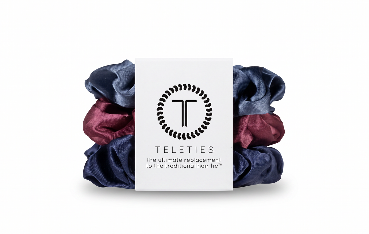 Doodlations Coffee Bar & Boutique Teleties silk scrunchies in navy, burgundy, and steel blue with inner coil grip.