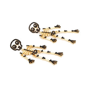 Doodlations Coffee Bar & Boutique articulated skeleton dangle earrings with black rhinestones on gold-tone alloy