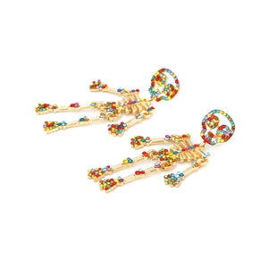 Doodlations Coffee Bar & Boutique articulated skeleton dangle earrings with vibrant multi-colored rhinestones