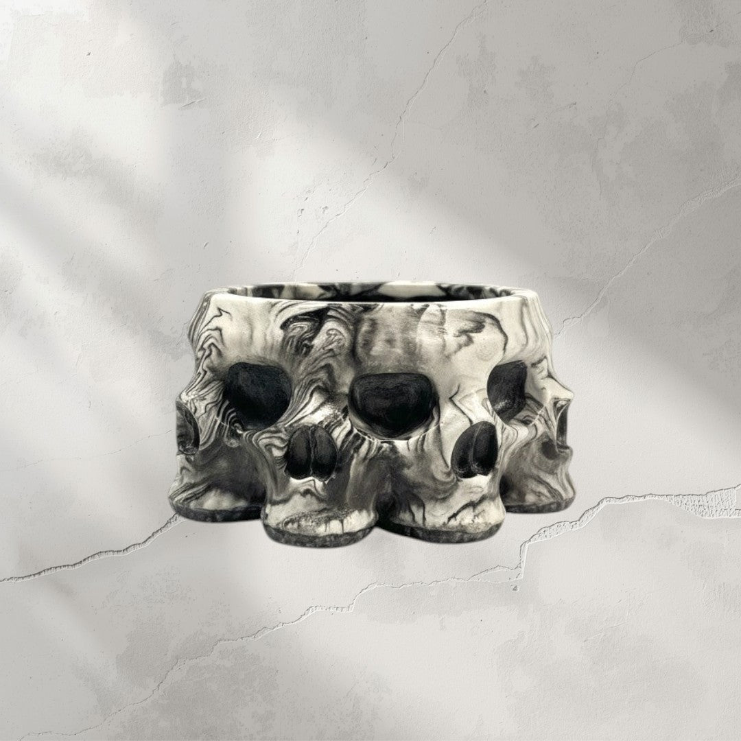 Doodlations Coffee Bar & Boutique Skull Concrete Candle with marbled black and white finish. Unique artisanal home decor.