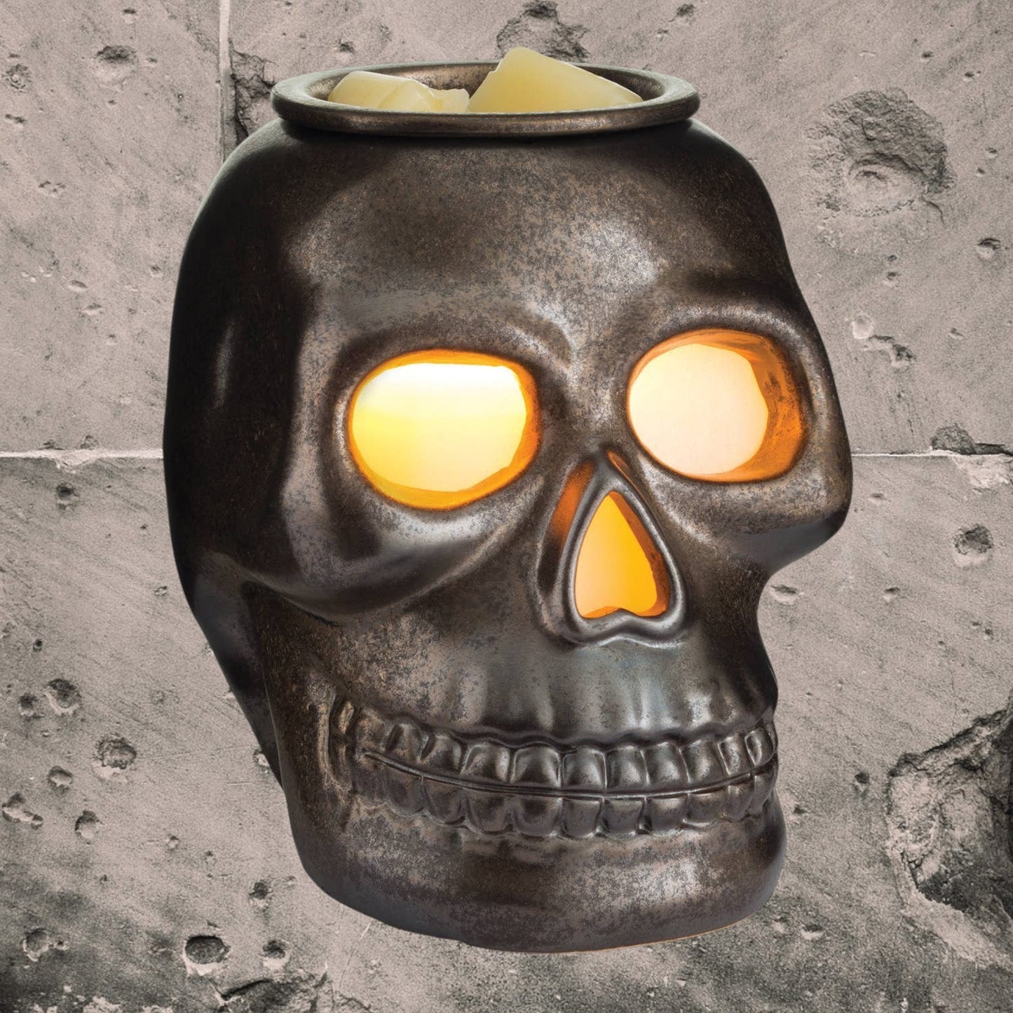 Doodlations Coffee Bar & Boutique gunmetal skull fragrance warmer with glowing eyes for gothic home decor
