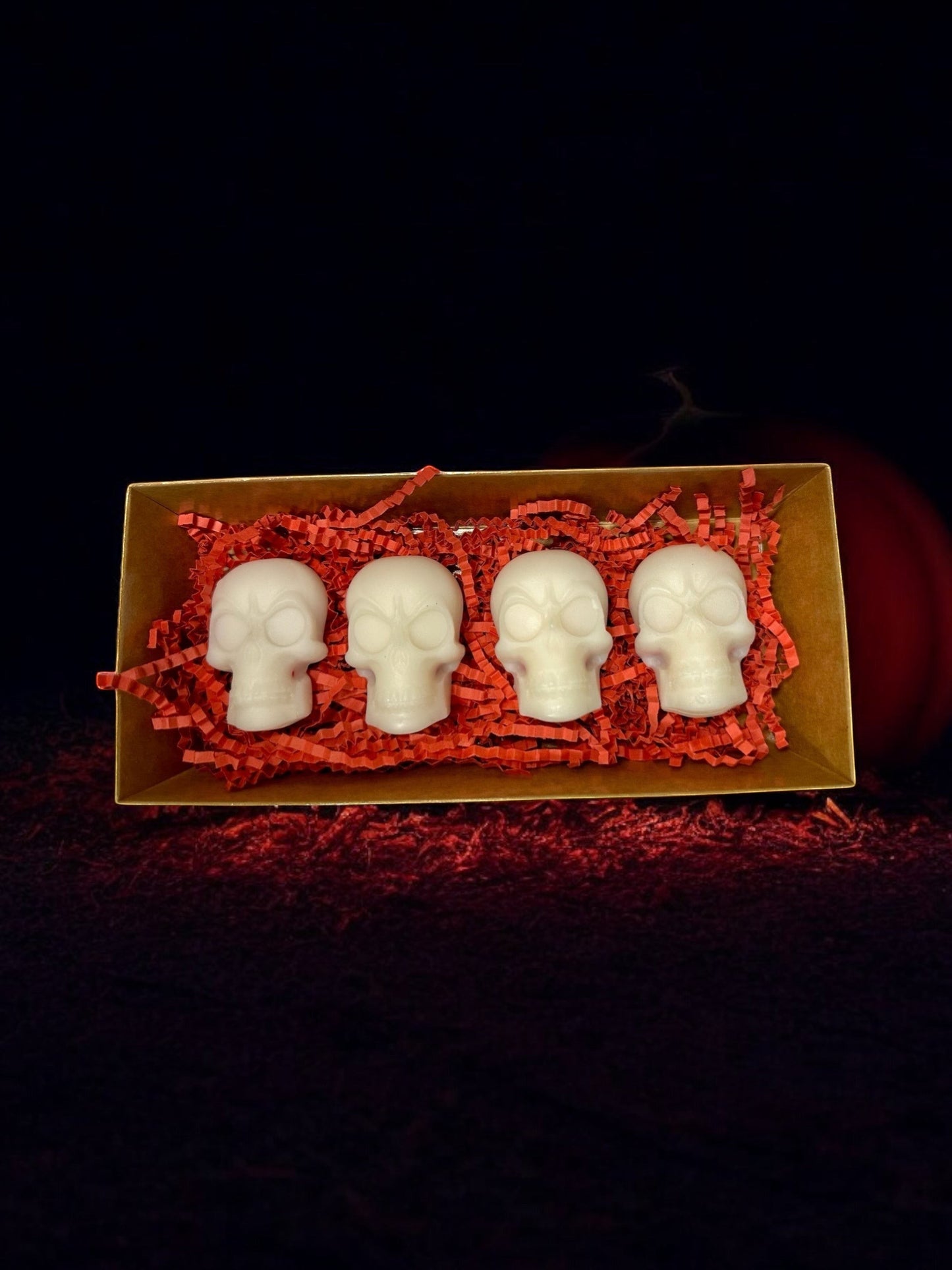 Doodlations Coffee Bar & Boutique white skull wax melts with cinnamon scent, 4 pack.
