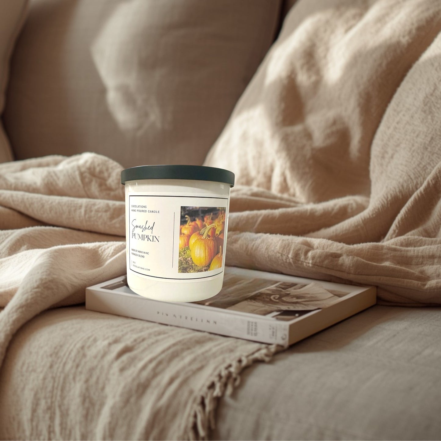Doodlations Coffee Bar & Boutique Smashed Pumpkin hand-poured soy blend candle with a dark green lid.