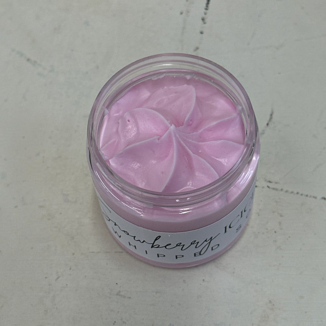 Doodlations Coffee Bar & Boutique Snowberry Icicles whipped soap in a 4 oz jar with a light pink, fluffy texture.
