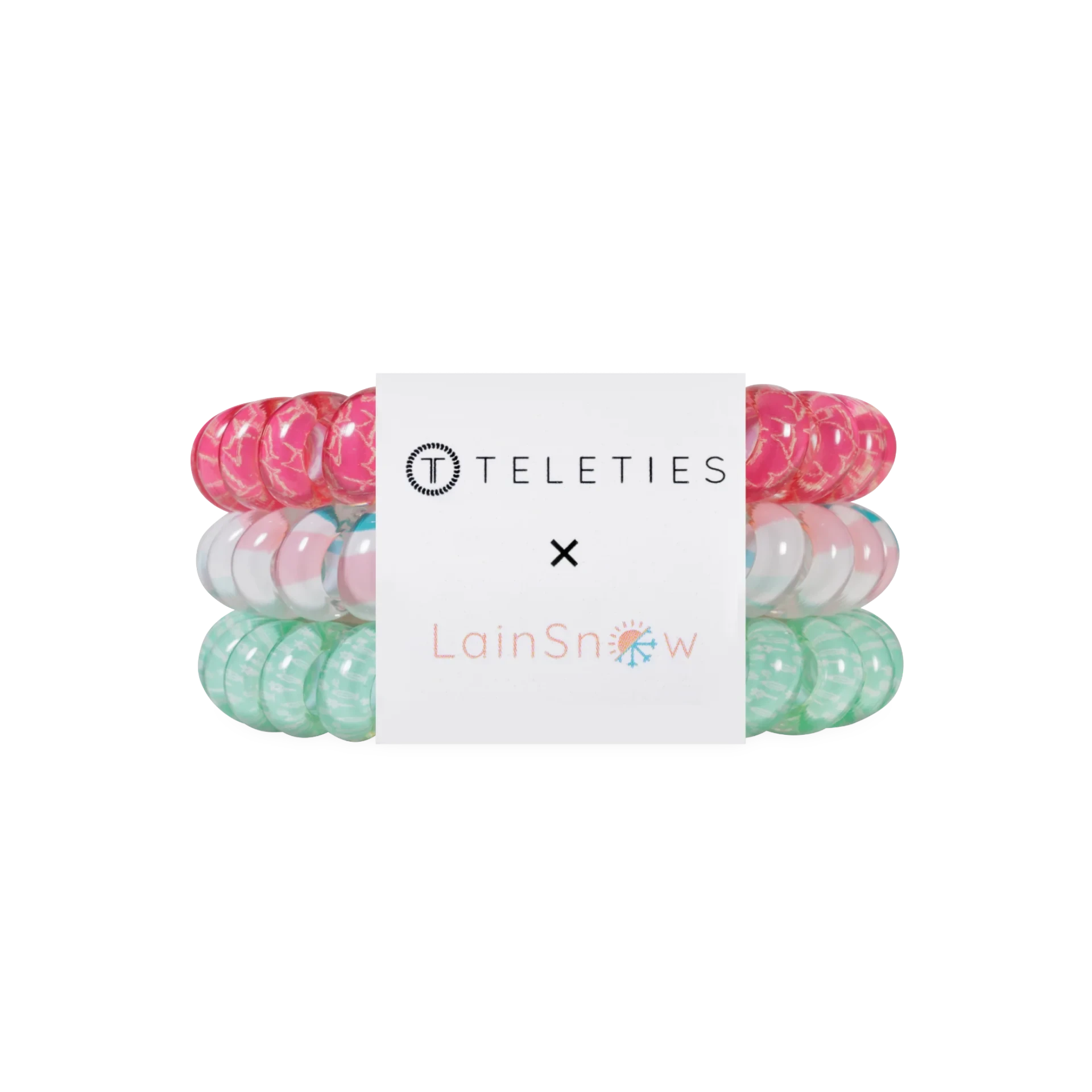 Doodlations Coffee Bar & Boutique Fin-tastic hair ties in a set of three spiral coils in pink, white, and green.