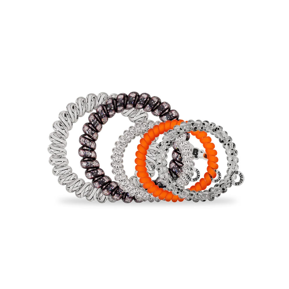 Doodlations Coffee Bar & Boutique Mummy Knows Best mix pack hair ties in black, orange, and clear spiral designs.