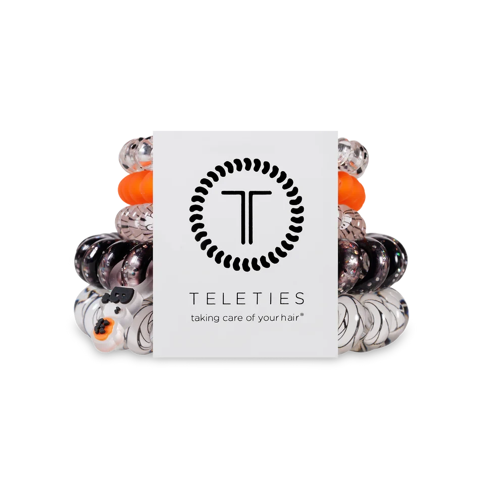 Doodlations Coffee Bar & Boutique Mummy Knows Best mix pack hair ties in black, orange, and clear spiral designs.