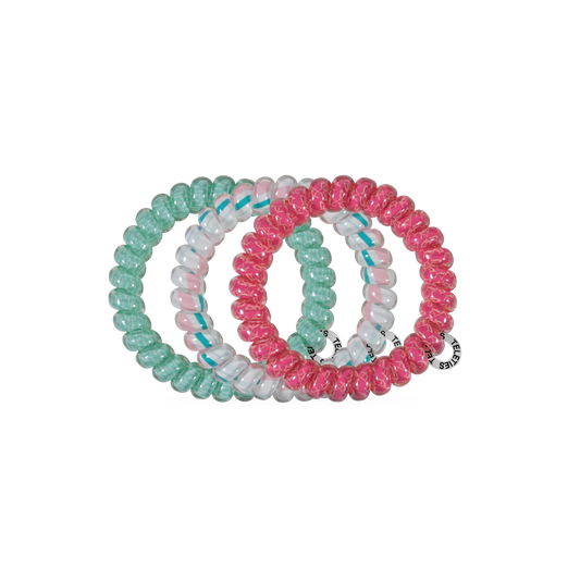 Doodlations Coffee Bar & Boutique Fin-tastic spiral hair ties in green, white, and pink, waterproof and snag-free.