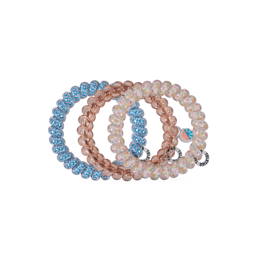 Doodlations Coffee Bar & Boutique Island Threads spiral hair ties in blue, rose gold, and patterned designs.