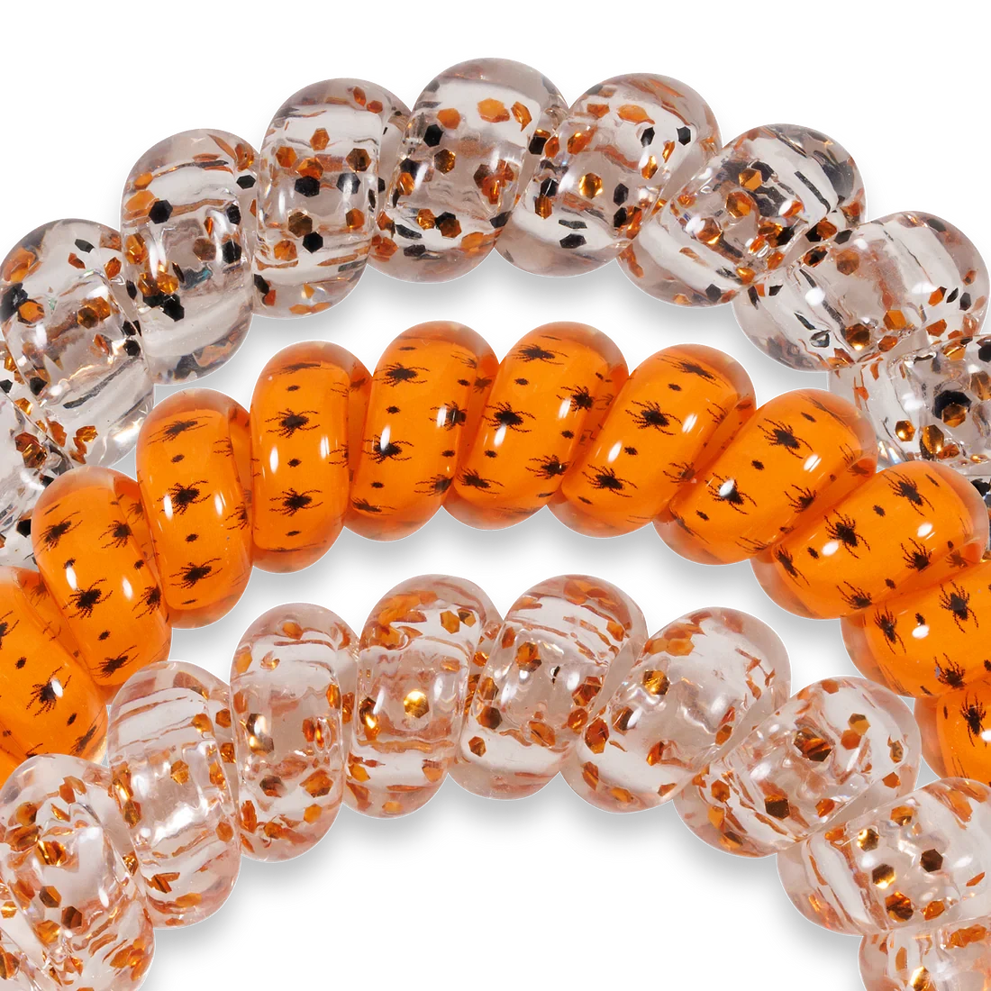 Doodlations Coffee Bar & Boutique Spooky Sparkles spiral hair ties in clear with glitter and orange with spider print.