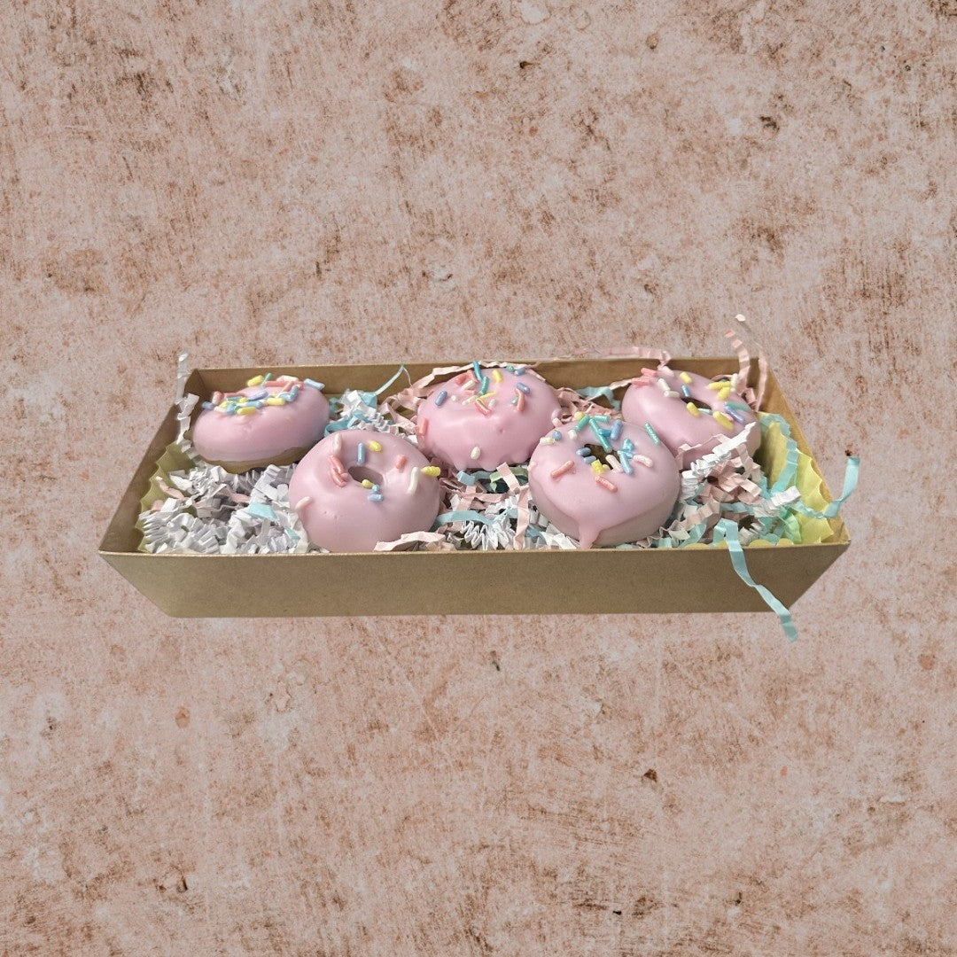Doodlations Coffee Bar & Boutique Strawberry Glazed Donut wax melts in a gift box with colorful sprinkles.