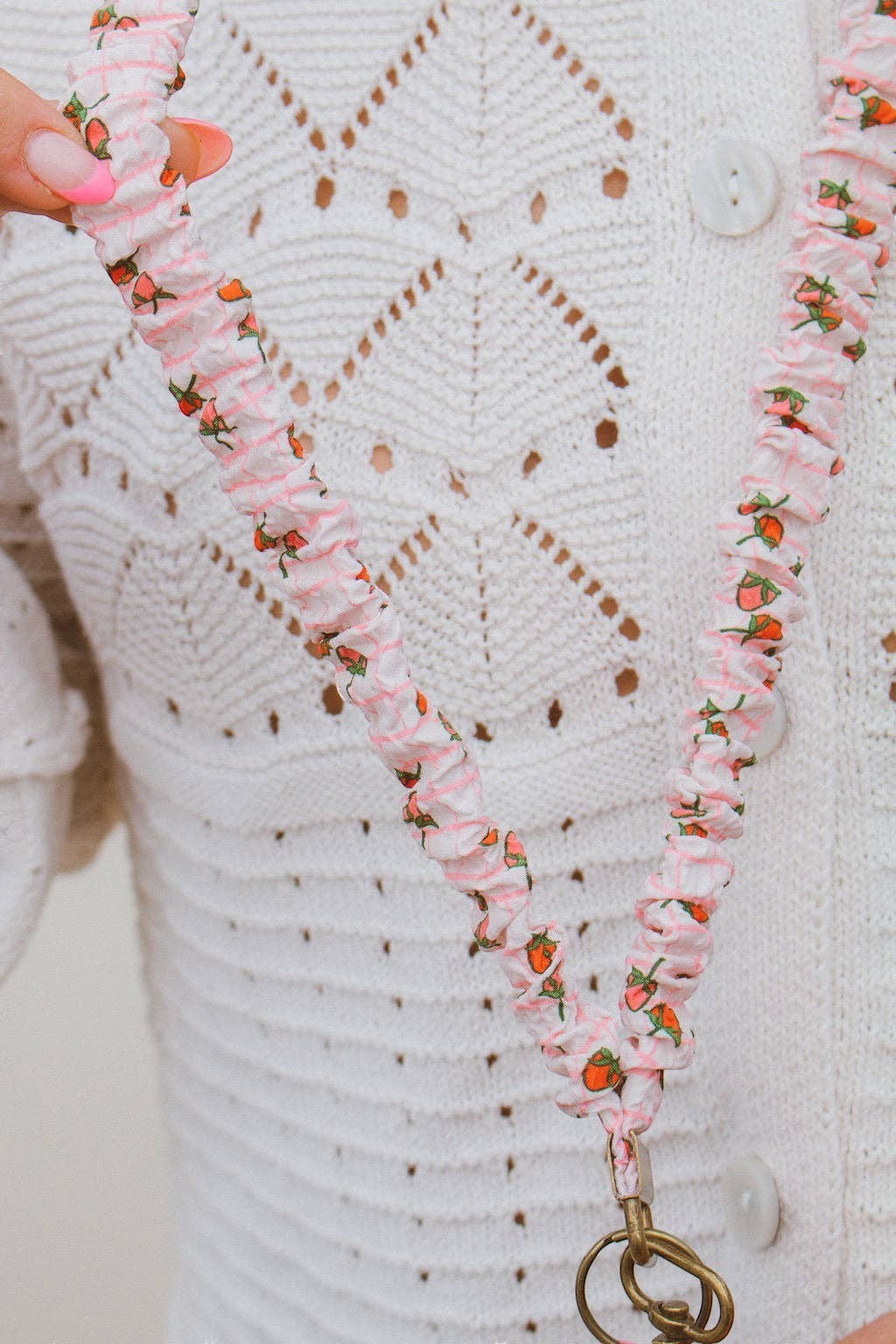 Doodlations Coffee Bar & Boutique Strawberry Fields lanyard in pink and cream gingham fabric with strawberry print