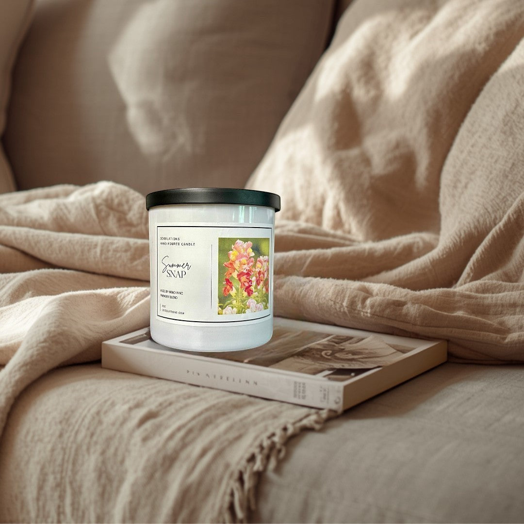 Doodlations Coffee Bar & Boutique Summer Snap hand-poured parasoy blend candle with floral-fruity scent.