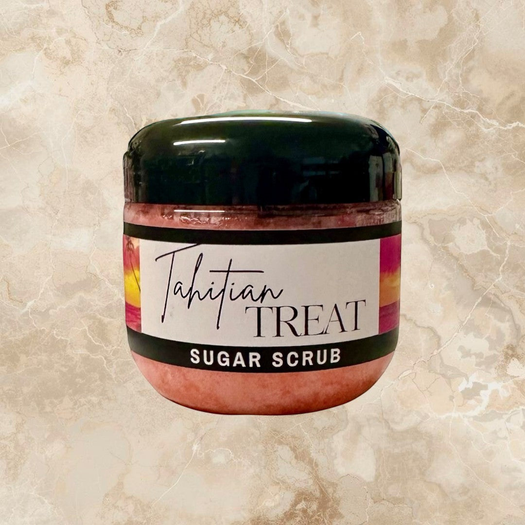 Doodlations Coffee Bar & Boutique Tahitian Treat Sugar Scrub in a clear jar with a black lid, pink scrub, and tropical sunset label.