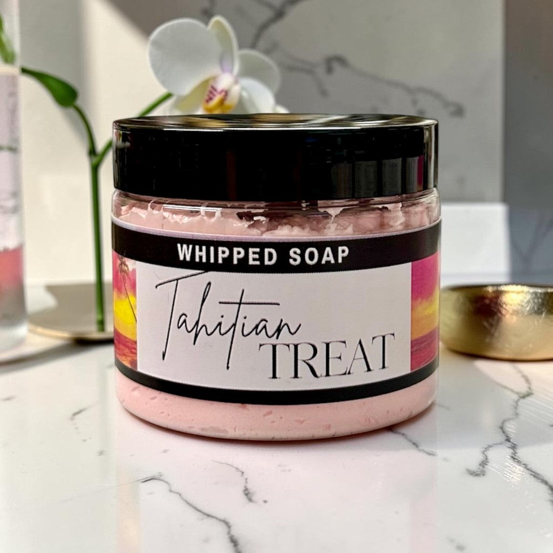 Doodlations Coffee Bar & Boutique Tahitian Treat whipped foaming soap in a jar with pink cream on a water splash base.