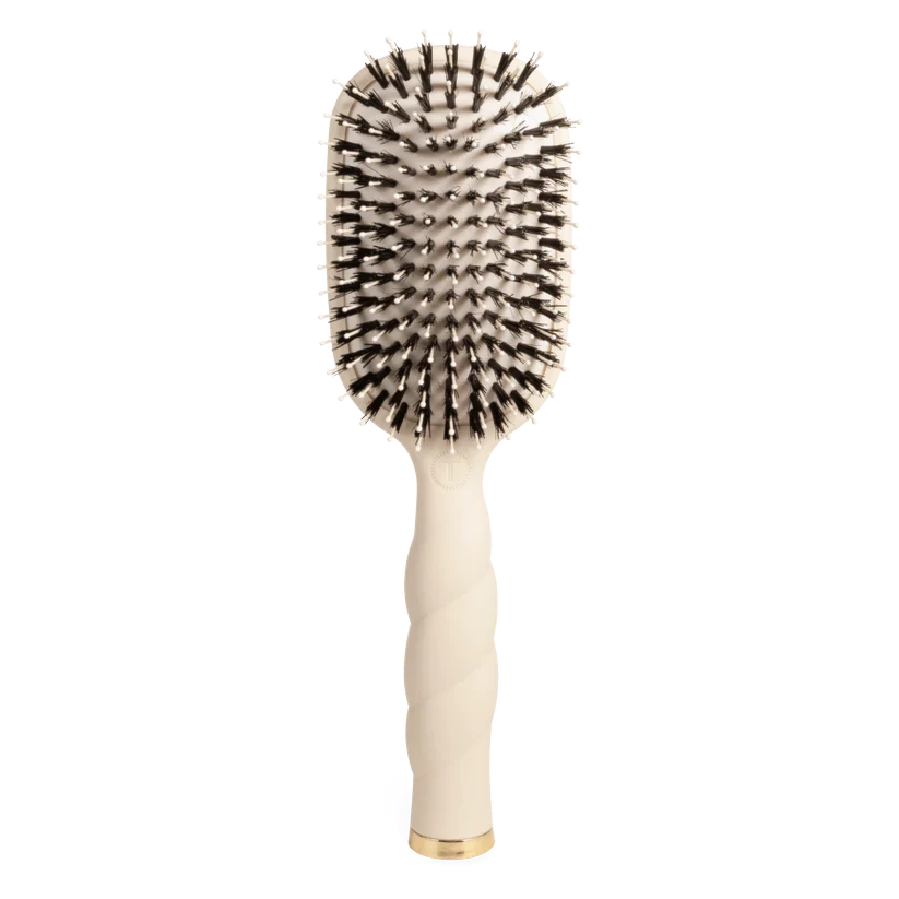 Doodlations Coffee Bar & Boutique Teleties tan boar bristle hair brush with ergonomic coil handle on black background