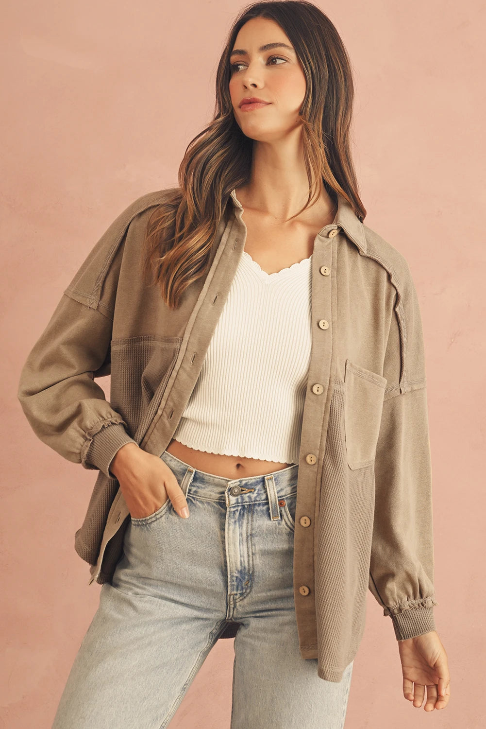 Doodlations Coffee Bar & Boutique tan mineral wash patchwork shacket worn by a model over a white ribbed top