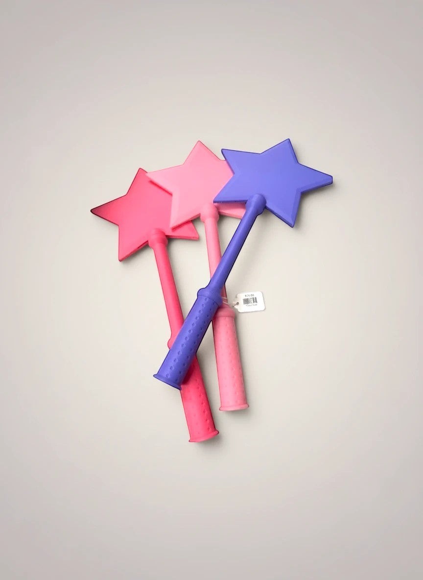 Doodlations Coffee Bar & Boutique Tap To Pay Wand in pink and purple star shapes for contactless payments.
