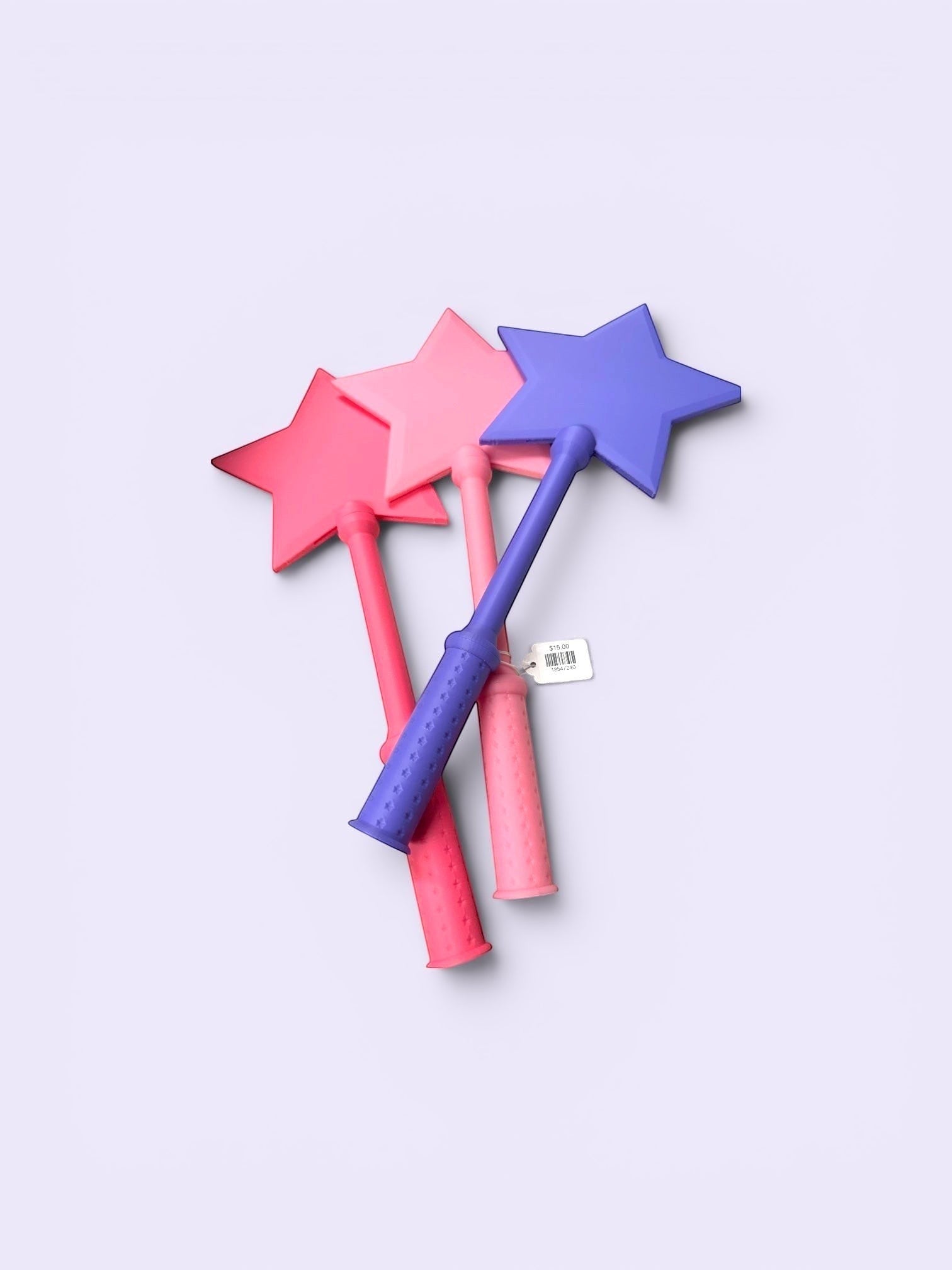 Doodlations Coffee Bar & Boutique Tap To Pay Wands in pink, coral, and purple with star tips.