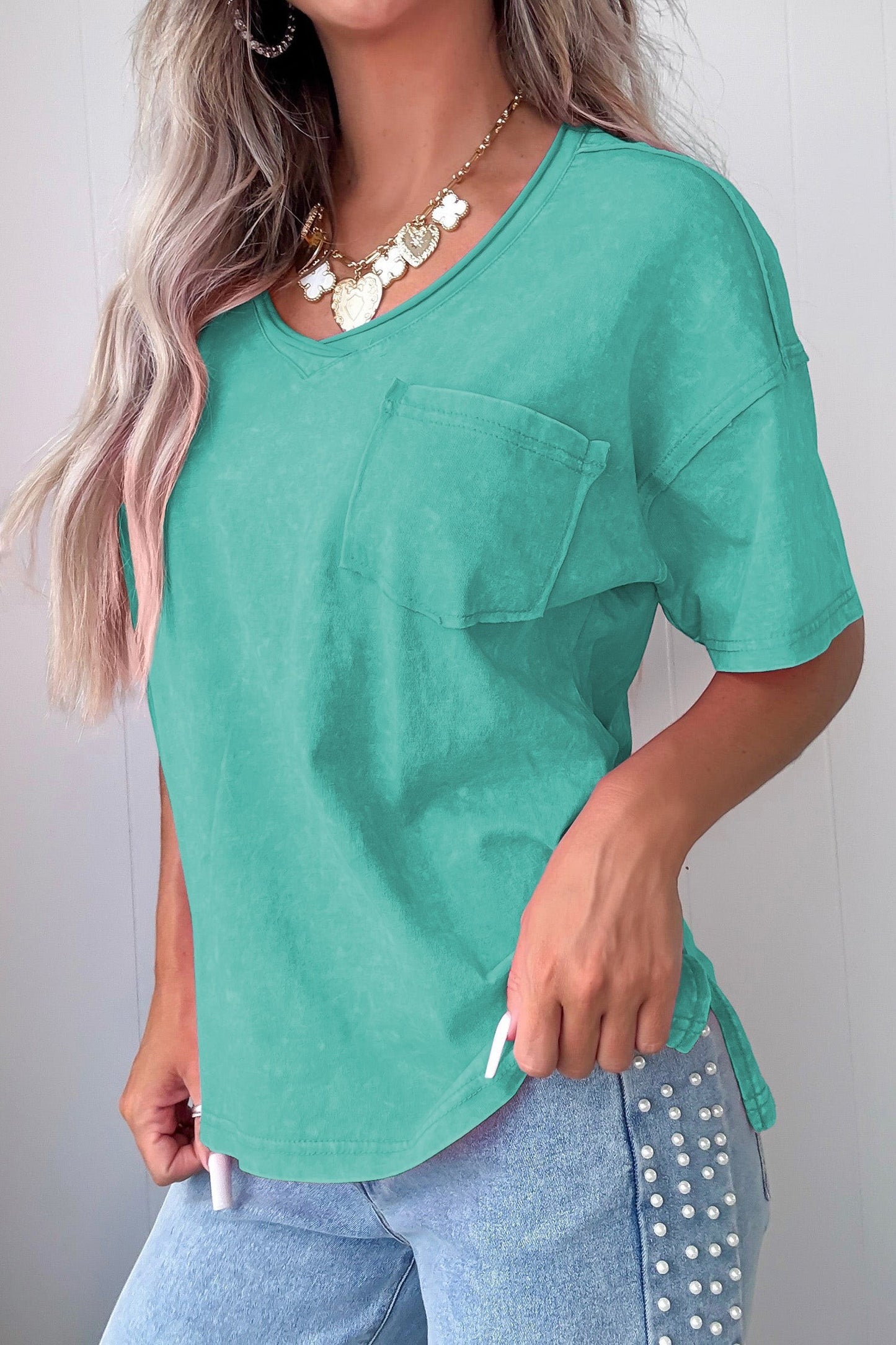 Doodlations Coffee Bar & Boutique teal mineral wash V-neck tee with chest pocket and relaxed fit.
