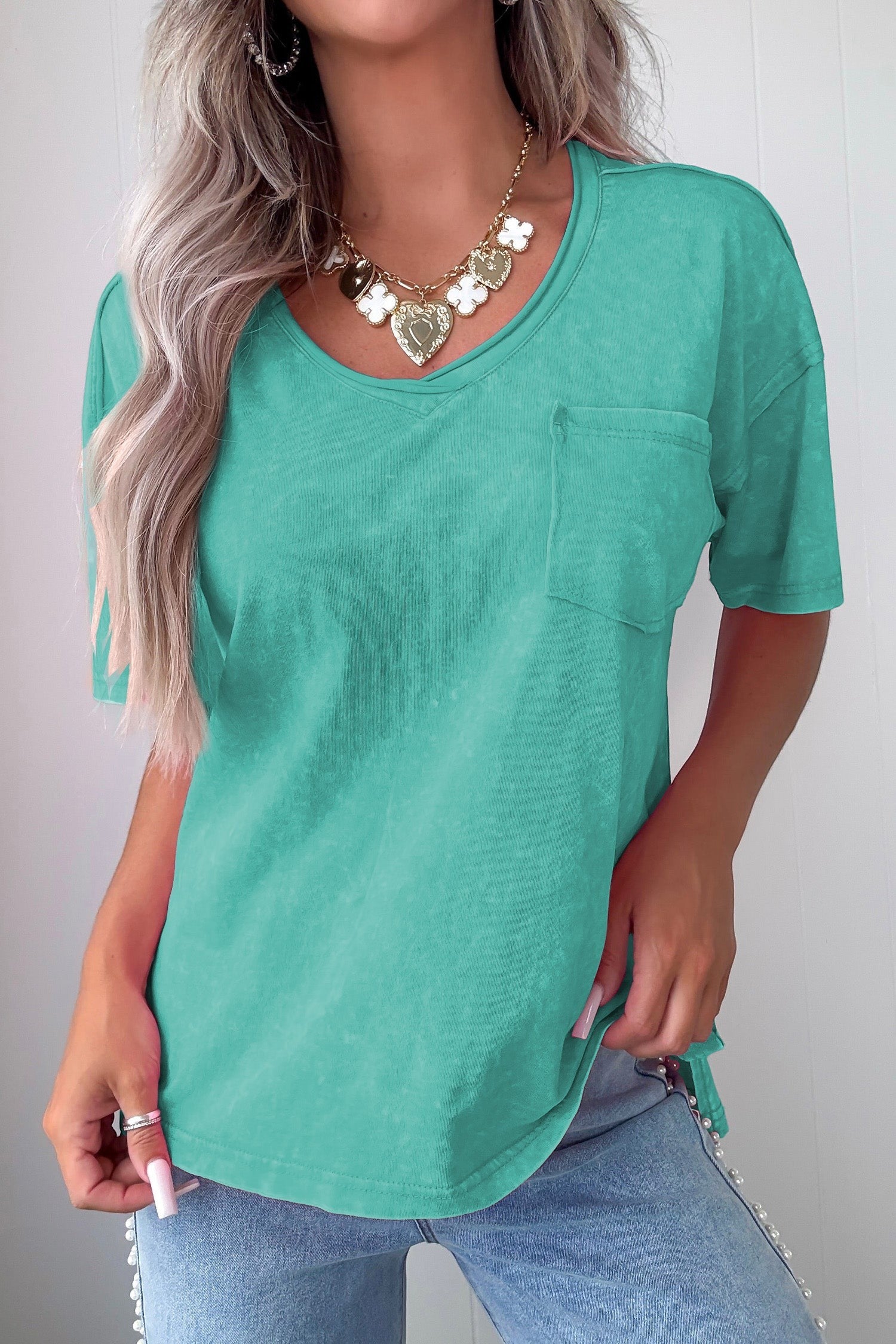 Doodlations Coffee Bar & Boutique teal mineral wash V-neck tee with chest pocket and relaxed fit.