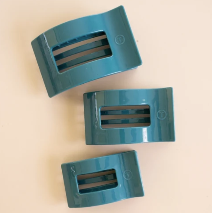 Doodlations Coffee Bar & Boutique TELETIES teal flat rectangle hair clips in three different sizes on a neutral background