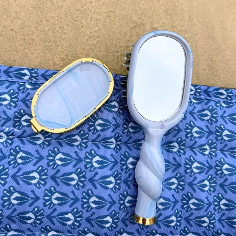 Doodlations Coffee Bar & Boutique Teleties boar bristle hair brush with blue marble handle, mirror, and storage.