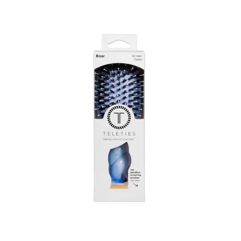 Doodlations Coffee Bar & Boutique Teleties boar bristle hair brush in tan packaging with ergonomic coil handle design.