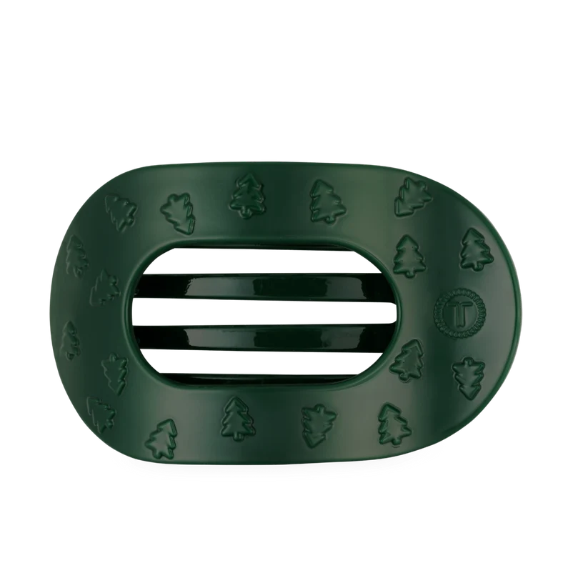 Doodlations Coffee Bar & Boutique Teleties flat round hair clip in dark green with festive Christmas tree pattern.