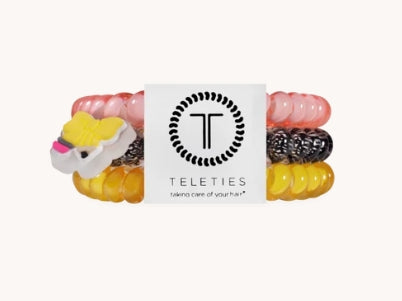 Doodlations Coffee Bar & Boutique Teleties Study Buddy hair ties in pink, black, and yellow with a butterfly charm.