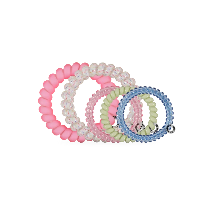 Doodlations Coffee Bar & Boutique Pinch Me! Teleties spiral hair ties in a mix of pink, green, and blue shades.