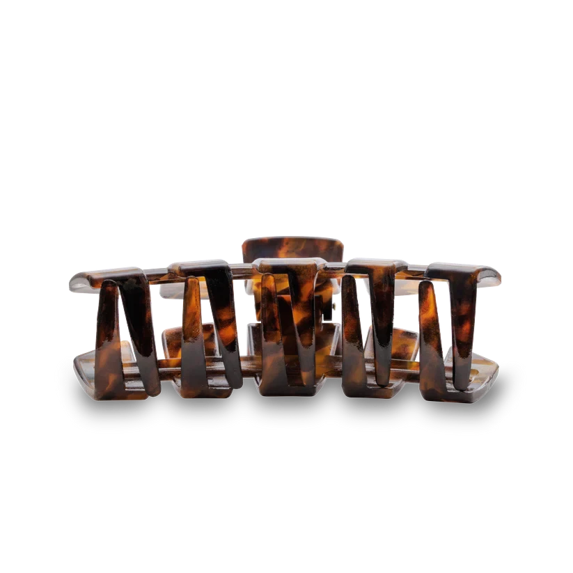 Doodlations Coffee Bar & Boutique classic tortoise shell pattern hair claw clip with durable bendable teeth.